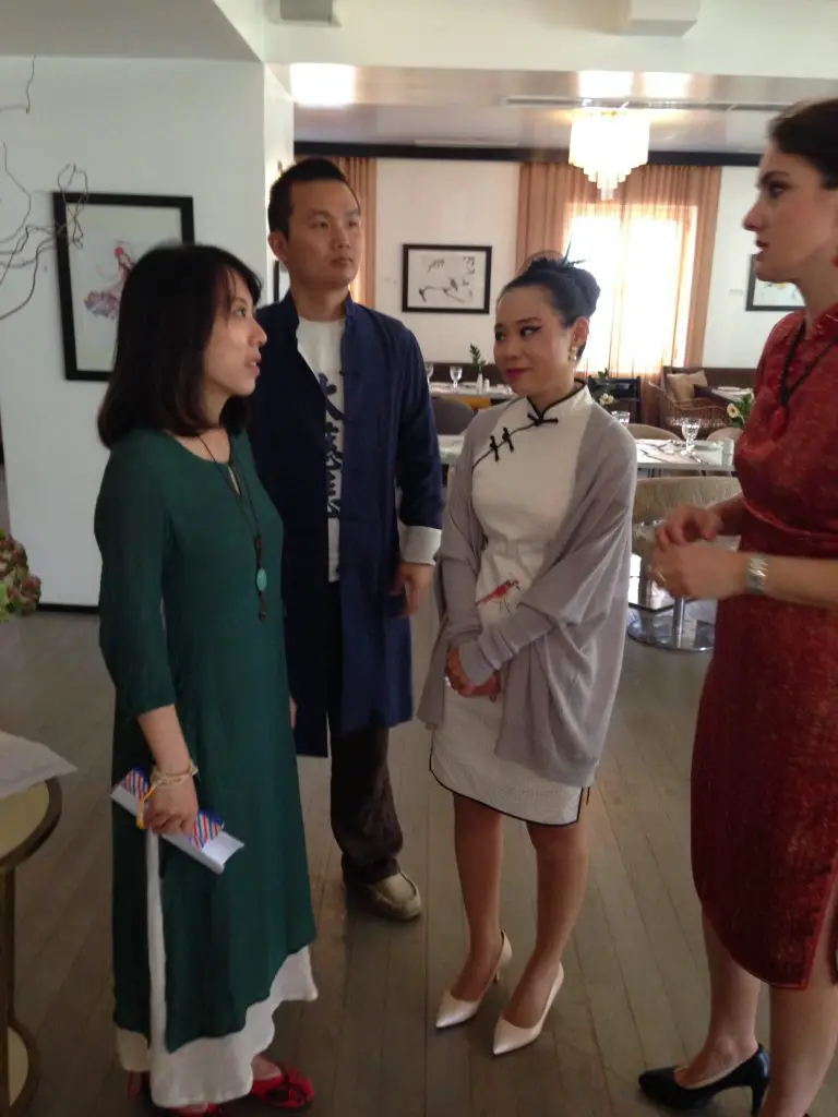 Kevin, Eley and artist Qinghua (Ioanna) together with Grecotel management