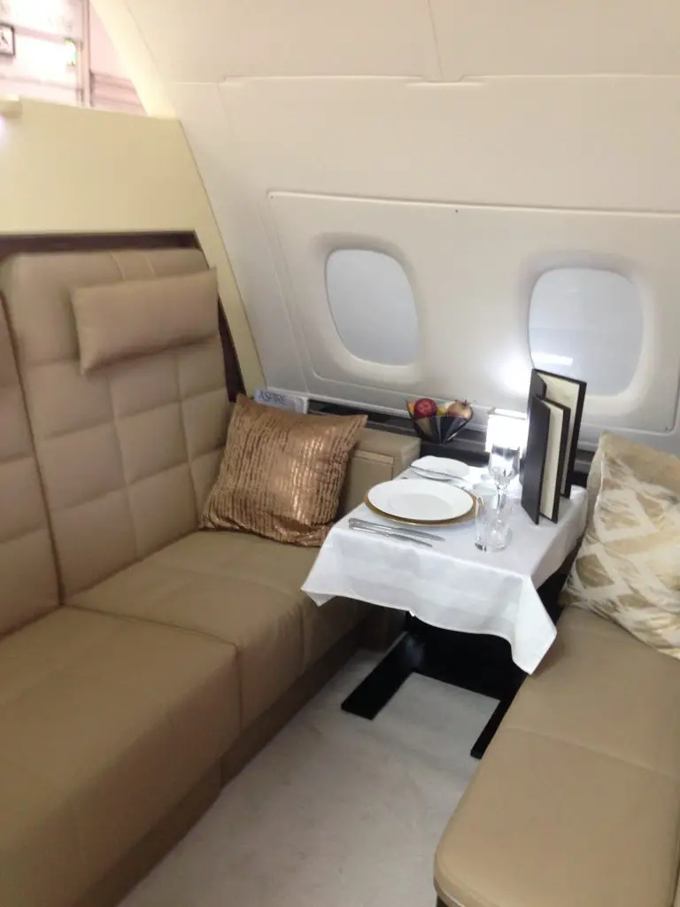 Private Living Room with Dining Table in The Residence on Etihad Airways