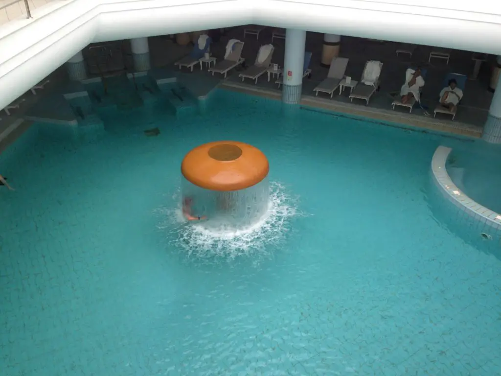 Indoor pool with flowing thermal waters at Thermae Sylla Spa Hotel - Evia
