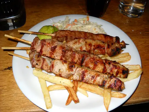 souvlaki on a skewer with fries - LifeBeyondBorders