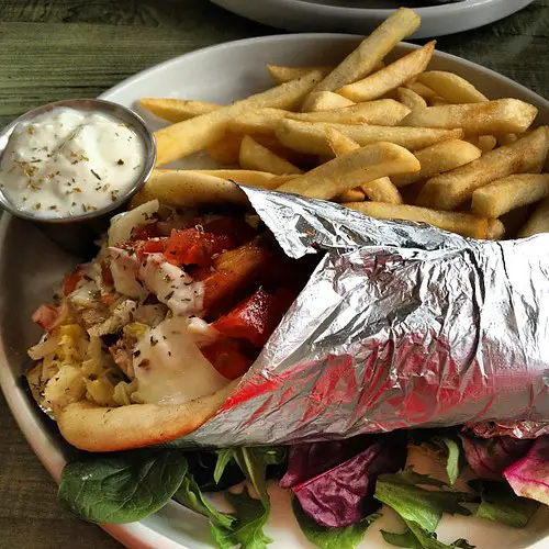 Souvlaki in Pitta with salad and fries - LifeBeyondBorders