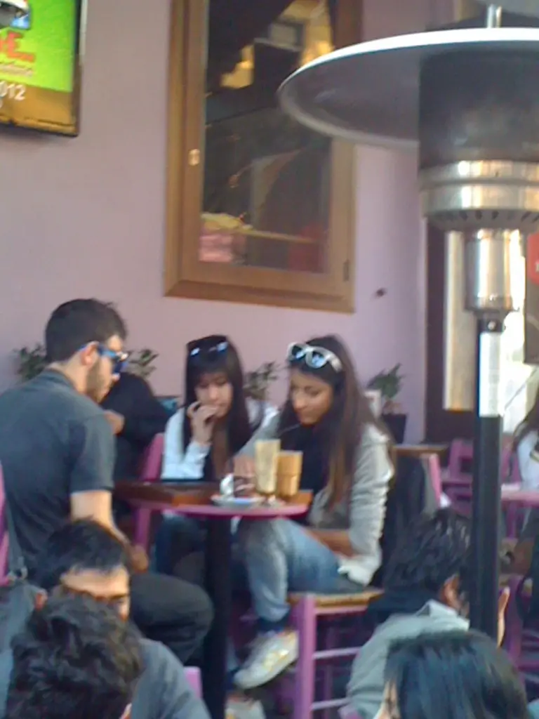 Young peopleplaying Tavli on a Sunday afternoon