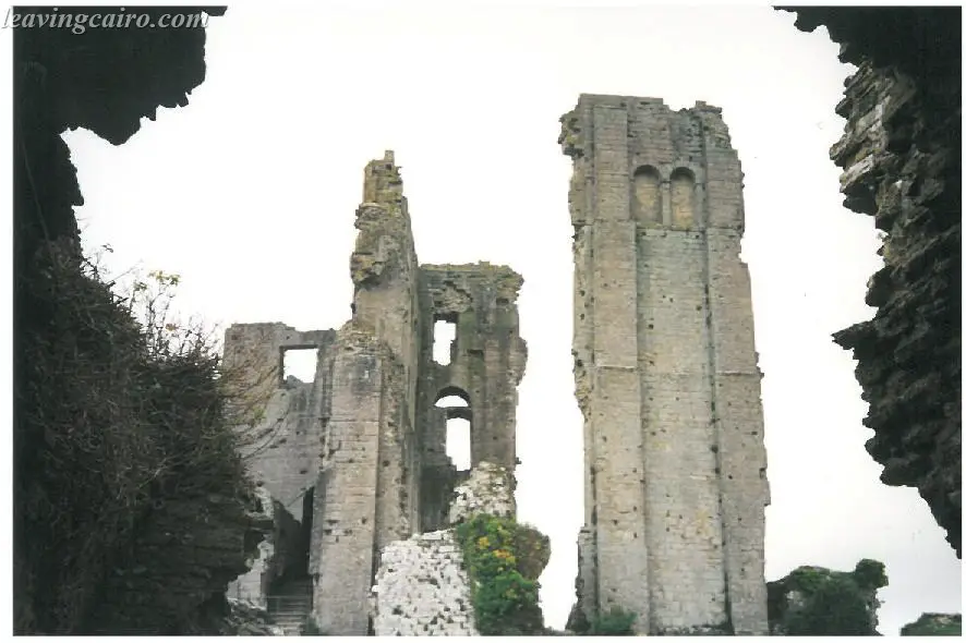 Corfe Castle Ruins rising from the grounds - LifeBeyondBorders