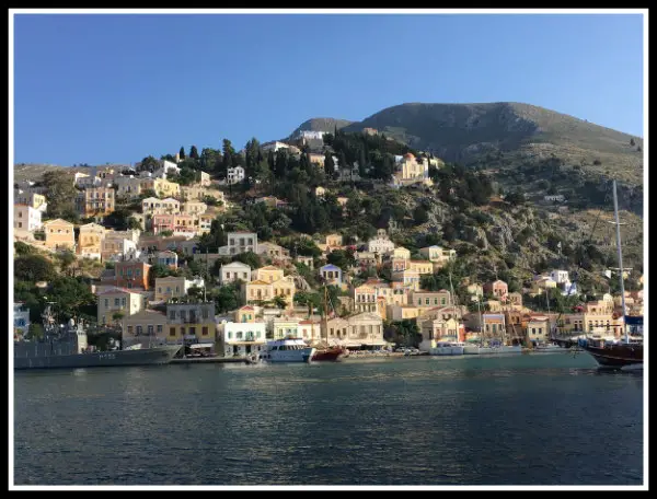 Symi Harbour as seen from the incoming ferry. Life Beyond Borders