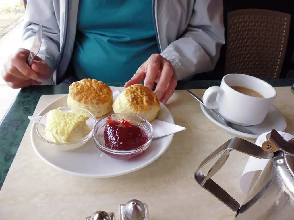 Enjoy a cream tea in the summer in Tiverton, Devon, UK.