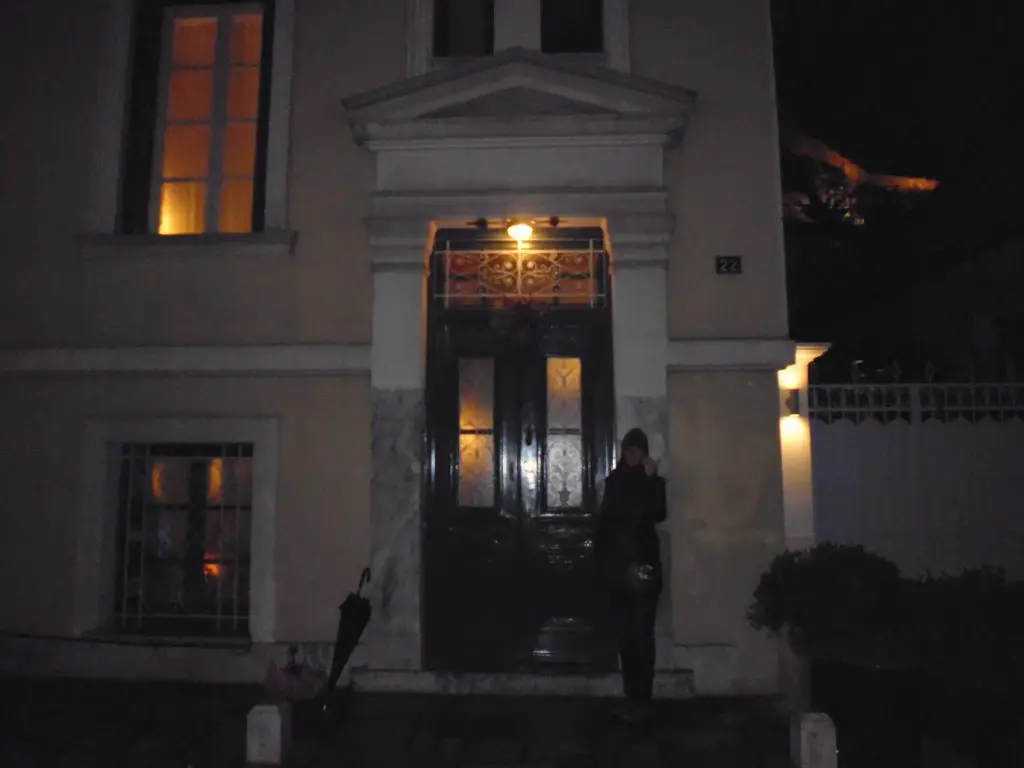 Outside the 19th Century neo-classical home - with the Acropolis rock in the background