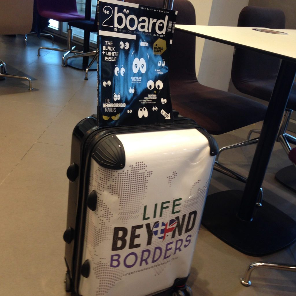 My self-branded acceptable cabin-baggae case for Ryanair flight, with Athens Airport monthly magazine