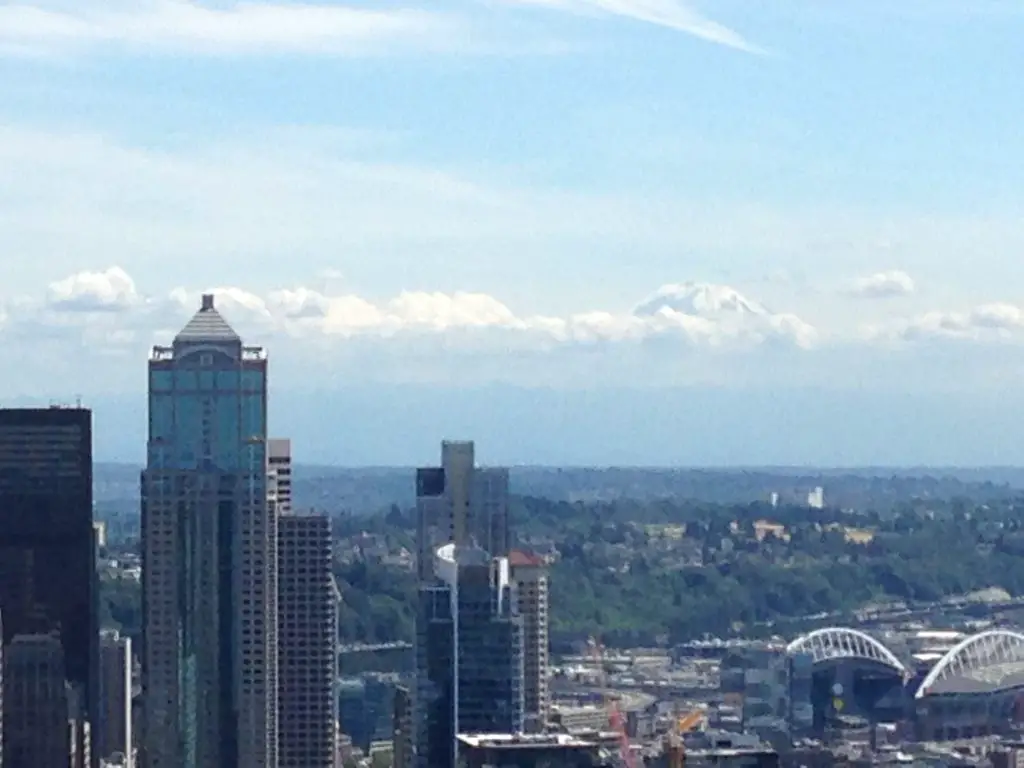 Can you see Mount Rainer in the background, pocking her head up about the clouds? Life Beyond Borders