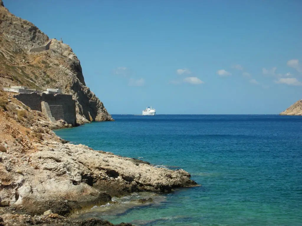 Watching the ferry come into Sifnos, Greece. Life Beyond Borders