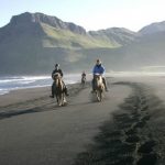 horse-riding-along-husey-beach-iceland