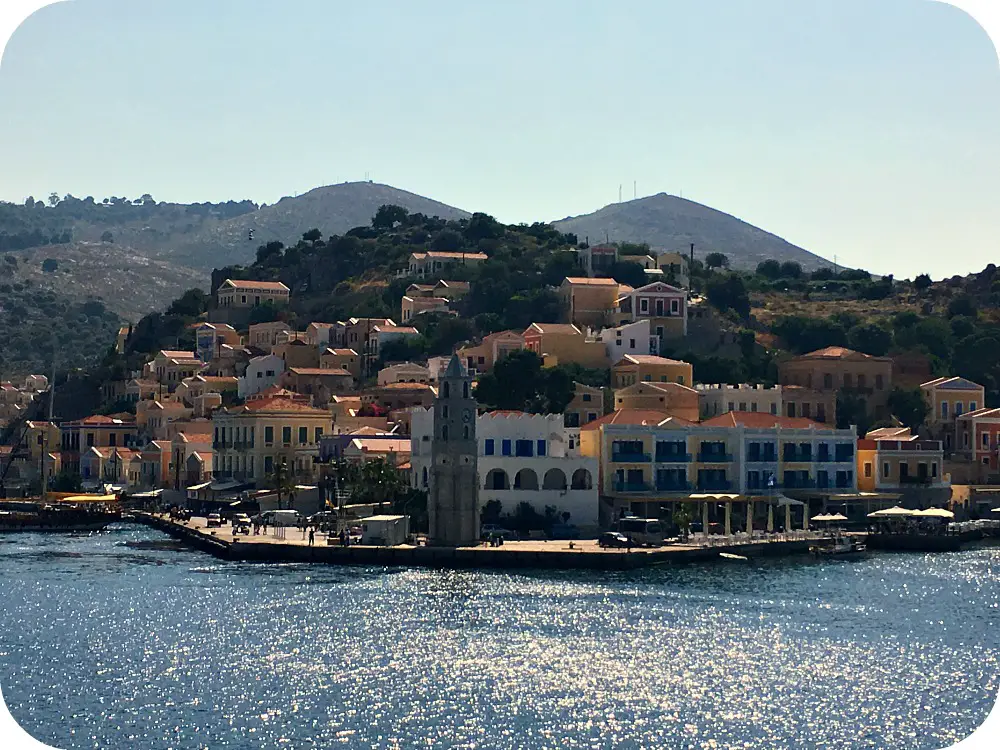 Beautiful view of Symi island Harbour - Greece. Life Beyond Borders