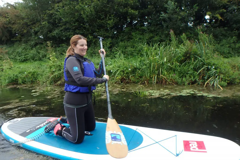 Kneeling on the Paddle board with Rob McPaddle Boarding - Grand Western Canal - Tiverton