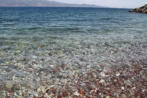 Stony beach on Hydra island - Greece. Life Beyond Borders