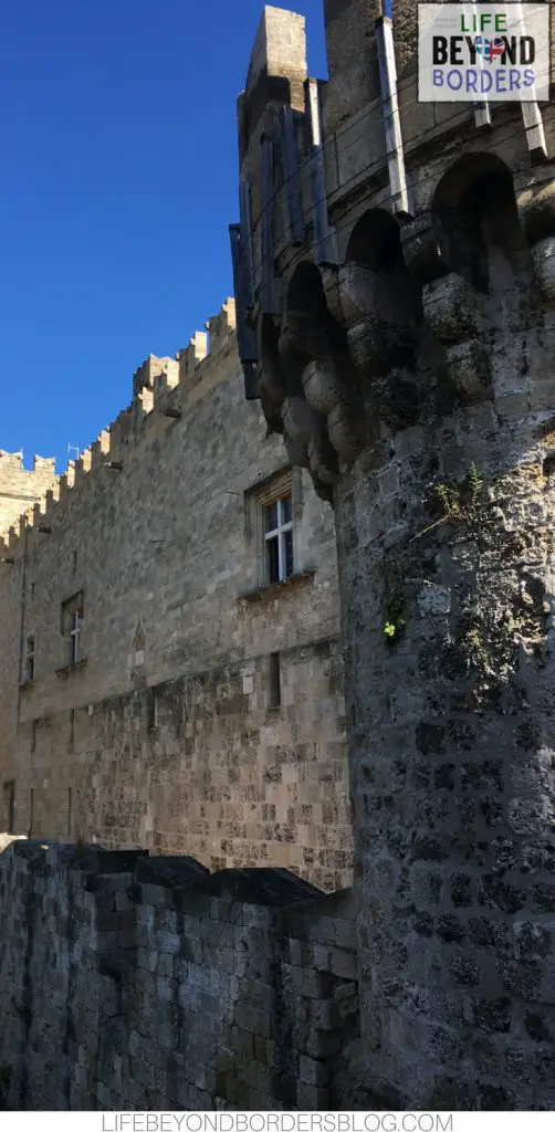 Castle and walls of Rhodes Old Town - Greece. Life Beyond Borders