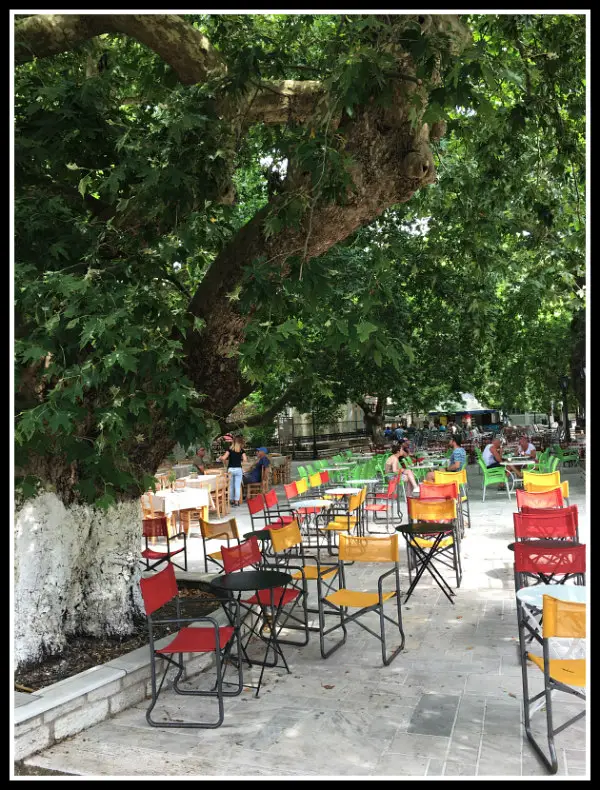 Karya Square - under the ancient plane trees - Lefkada island - Greece. Life Beyond Borders